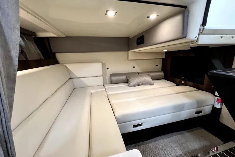 Slide: The Image of Luxurious interior of 2018 Monterey 355 Sport Yacht with plush seating and modern lighting. - 70