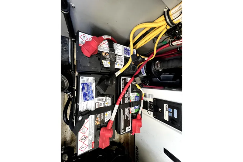 Slide: The Image of Battery compartment of a 2018 Monterey 355 Sport Yacht with wiring and connections. - 119