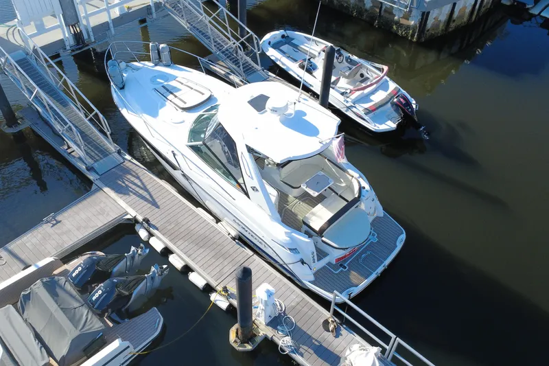 Slide: The Image of 2018 Monterey 355 Sport Yacht docked at marina, aerial view. - 13