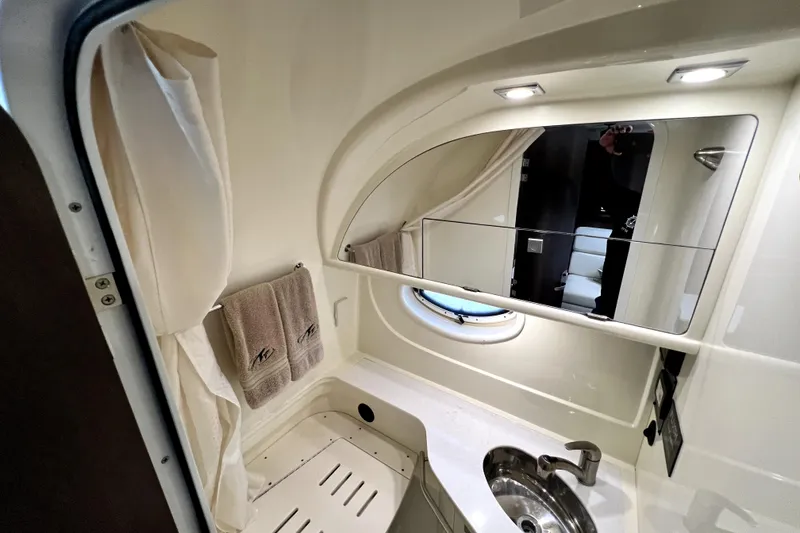 Slide: The Image of Luxurious bathroom interior of 2018 Monterey 355 Sport Yacht with modern fixtures and lighting. - 40