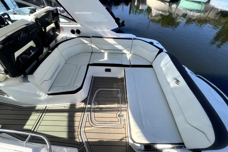 Slide: The Image of 2018 Monterey 355 Sport Yacht interior with luxurious seating and sleek design. - 109