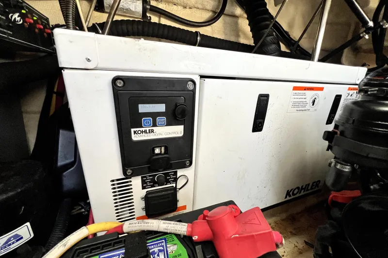 Slide: The Image of Kohler generator in 2018 Monterey 355 Sport Yacht engine room, featuring advanced digital control. - 61