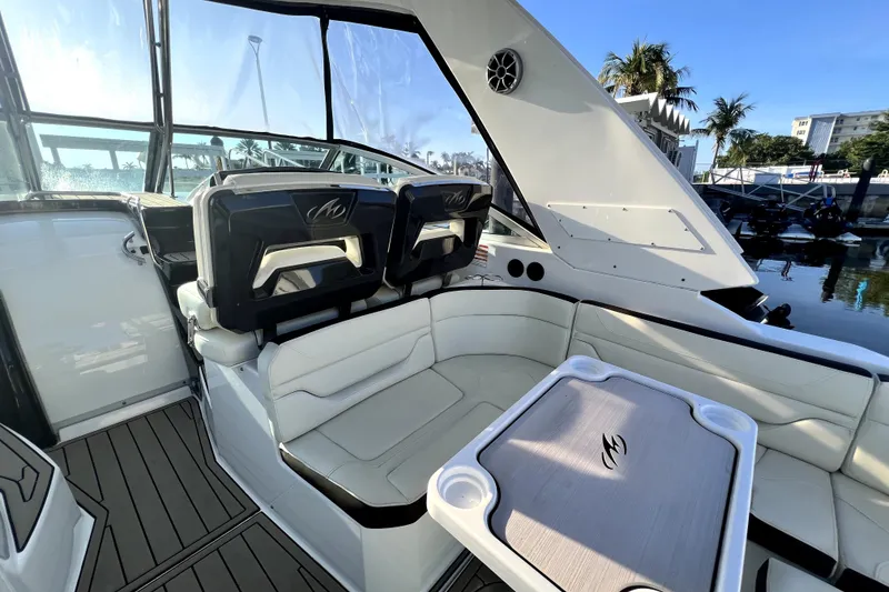 Slide: The Image of 2018 Monterey 355 Sport Yacht interior with sleek seating and modern design. - 133