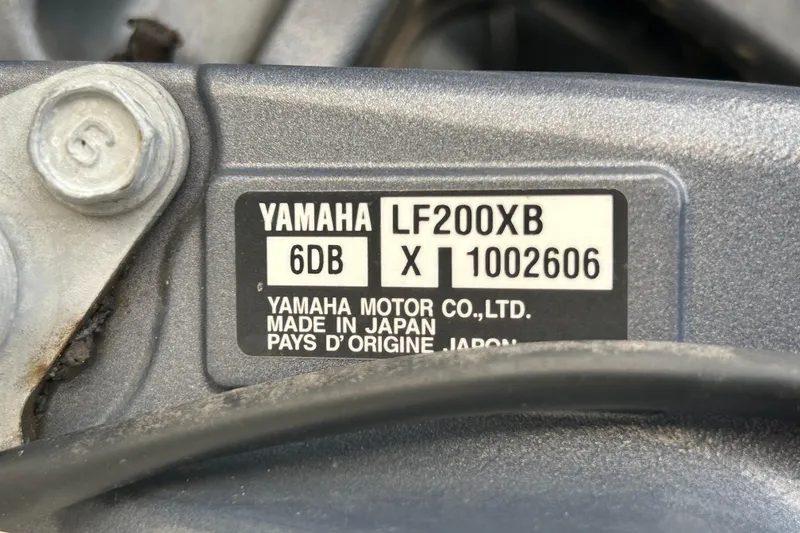 Slide: The Image of Yamaha LF200XB engine label on 2018 NauticStar 28 XS, made in Japan. - 105