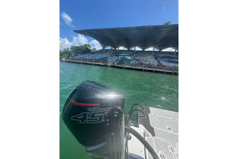 Slide: The Image of Boat with SCB S22 engine near waterfront stadium, 2023 model. - 8