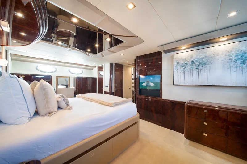 Slide: The Image of Luxurious bedroom interior of 2001 Lazzara 94 yacht with elegant decor and modern amenities. - 23