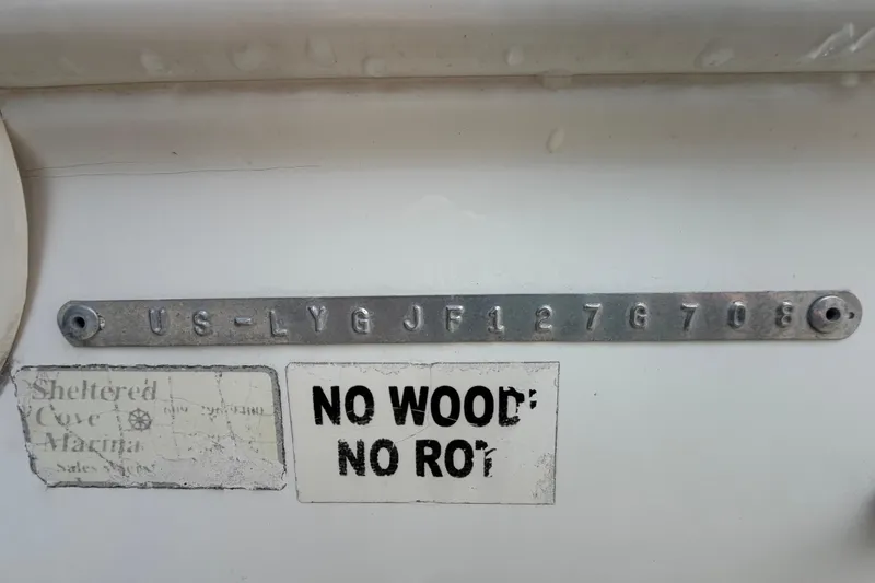 Slide: The Image of 2008 Sea Fox 216 Dual Console hull identification number and "No Wood No Rot" label. - 53