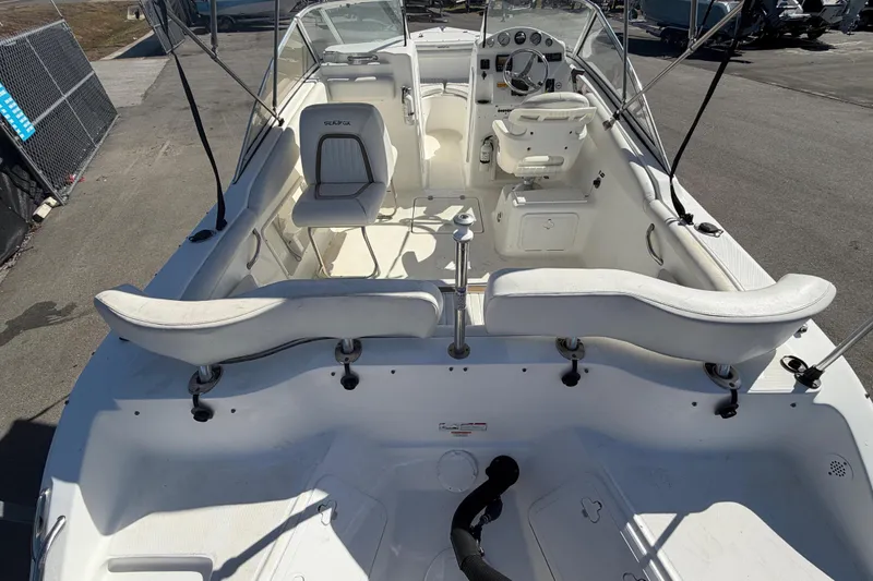 Slide: The Image of 2008 Sea Fox 216 Dual Console boat interior with seating and steering wheel. - 15