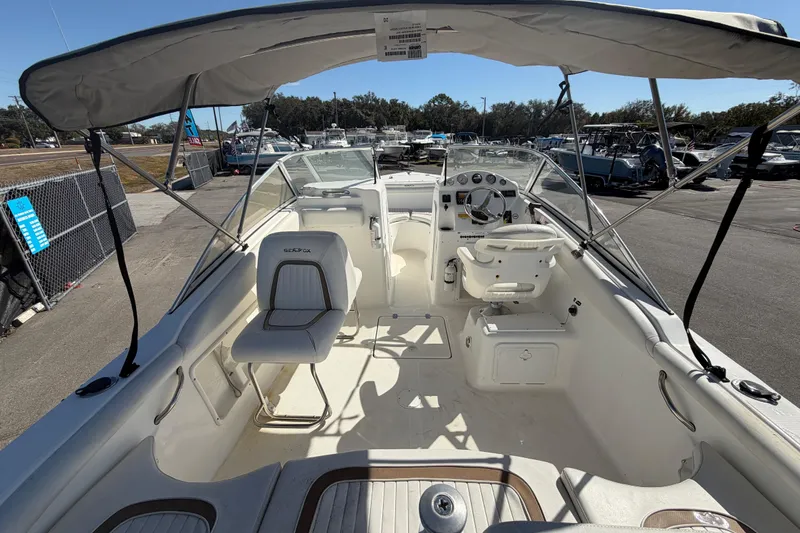 Slide: The Image of 2008 Sea Fox 216 Dual Console boat interior with seating and steering wheel. - 17
