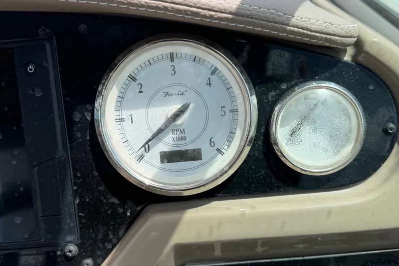 Slide: The Image of Close-up of a 2018 Regal 28 Express tachometer, displaying RPM readings. - 37