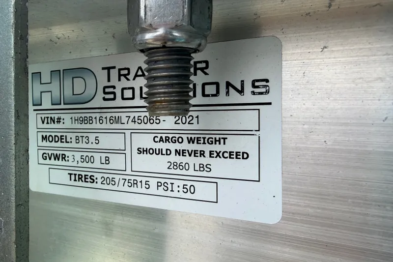 Slide: The Image of Label on HD Trailer Solutions with specifications and weight limits. - 61