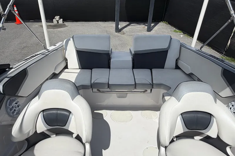 Slide: The Image of Interior of a 2018 Scarab 195 G boat with gray seating and modern design. - 47
