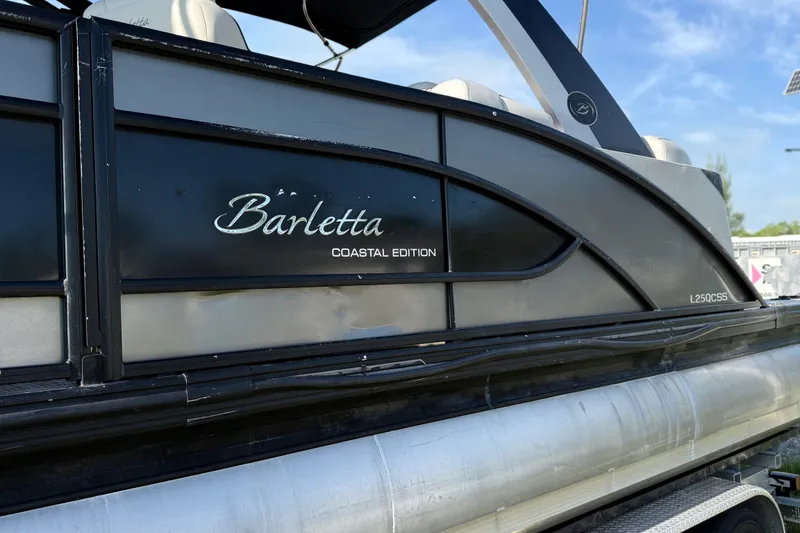 Slide: The Image of 2020 Barletta L-Class L25QCSSA Coastal Edition pontoon boat, side view. - 40