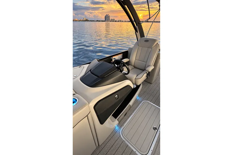 Slide: The Image of 2020 Barletta L-CLASS L25QCSSA boat interior with sunset view over water. - 19