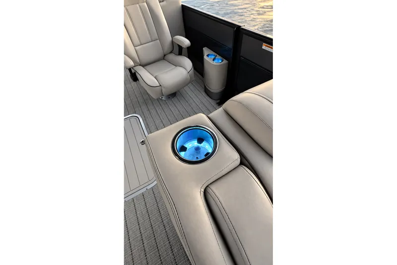 Slide: The Image of Luxurious seating and illuminated cup holders on 2020 Barletta L-Class L25QCSSA Coastal Edition boat. - 28