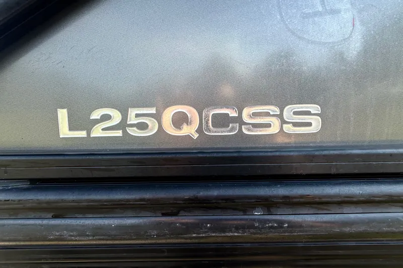 Slide: The Image of 2020 Barletta L-CLASS L25QCSSA Coastal Edition Sport Arch emblem on a dark surface. - 39