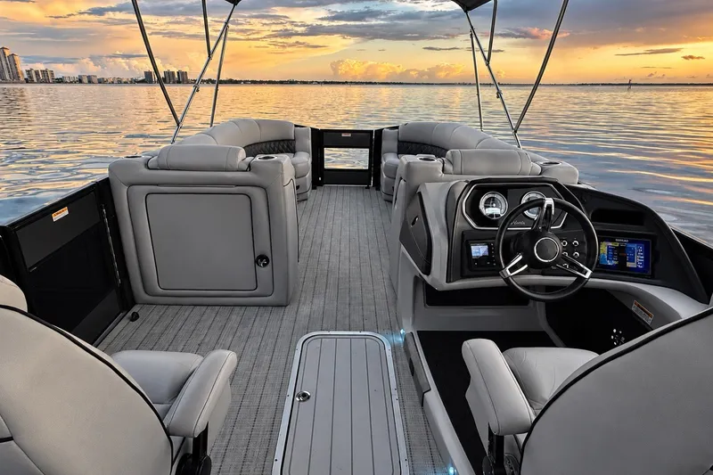 Slide: The Image of 2020 Barletta L-CLASS L25QCSSA boat interior at sunset on calm water. - 33