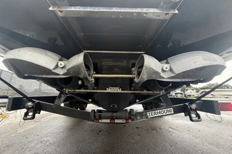 Slide: The Image of Rear view of a 2018 Scarab 255 ID boat on a trailer. - 5