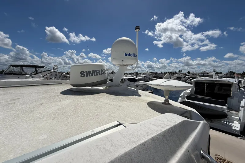 Slide: The Image of 2018 Sea Ray Sundancer 350 Coupe with Simrad and Intellian equipment on deck. - 114