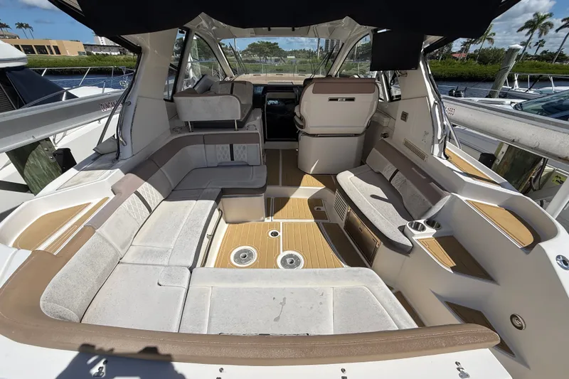 Slide: The Image of Interior of 2018 Sea Ray Sundancer 350 Coupe with spacious seating and modern design. - 14