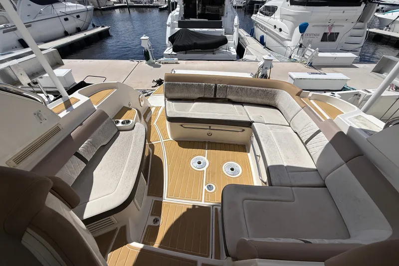 Slide: The Image of 2018 Sea Ray Sundancer 350 Coupe interior with spacious seating and elegant design. - 79