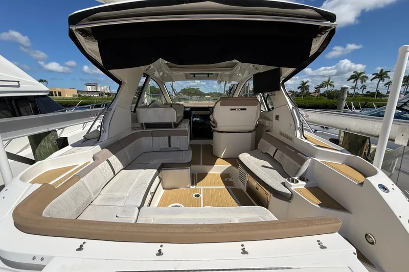 Slide: The Image of 2018 Sea Ray Sundancer 350 Coupe interior with spacious seating and modern design. - 13