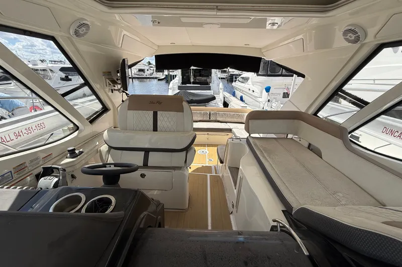 Slide: The Image of Interior view of 2018 Sea Ray Sundancer 350 Coupe yacht at marina. - 72