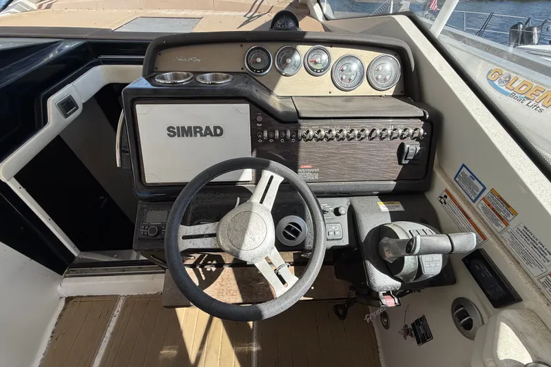 Slide: The Image of Cockpit of 2018 Sea Ray Sundancer 350 Coupe with Simrad navigation system. - 25