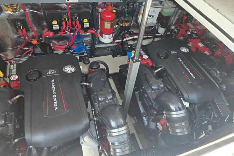 Slide: The Image of Engine room of a 2022 Regal 33 Express with dual Volvo Penta engines. - 33