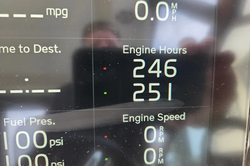 Slide: The Image of Display panel showing engine hours and speed on a 2022 Regal 33 Express. - 32