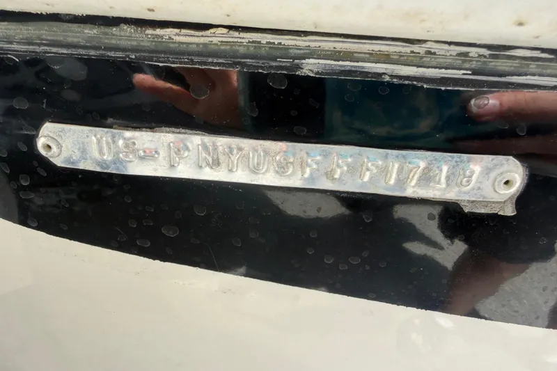 Slide: The Image of 2018 Stingray 204 LR boat identification plate with serial number. - 60