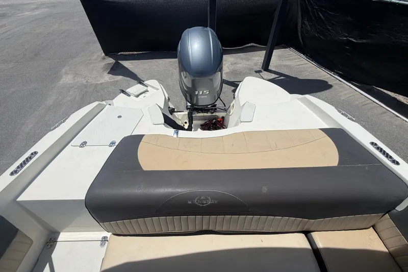 Slide: The Image of 2018 Stingray 204 LR boat with Yamaha 115 engine, rear seating view. - 54