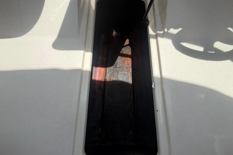 Slide: The Image of Interior of a 2018 Stingray 204 LR boat, shadow and light play. - 27