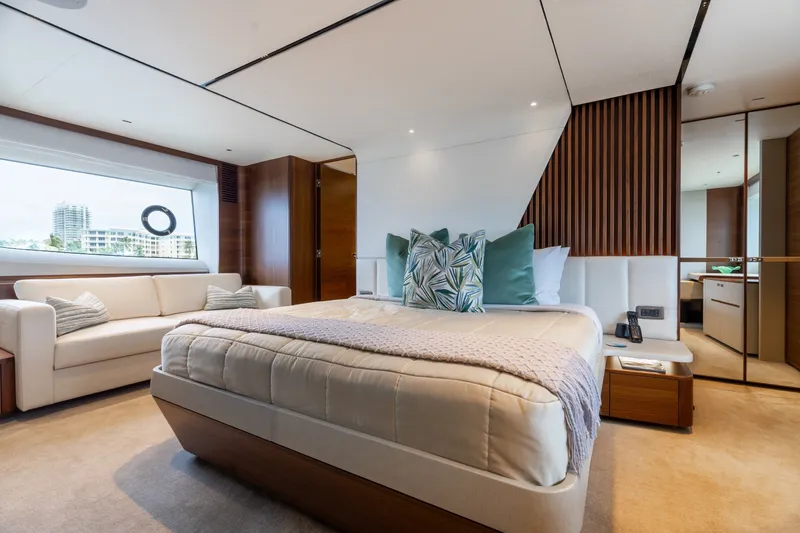 Slide: The Image of Luxurious bedroom interior of 2021 Princess Y85 yacht with modern design and large window view. - 41