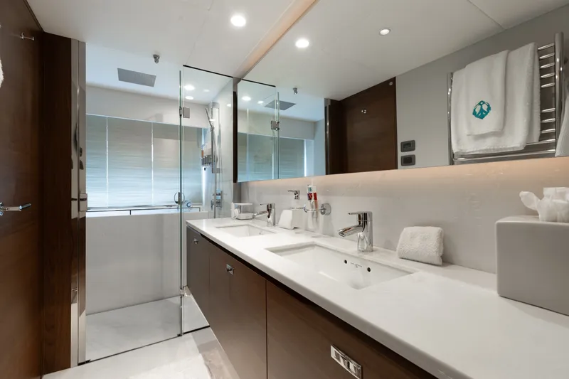 Slide: The Image of Luxurious bathroom in 2021 Princess Y85 yacht with dual sinks and modern fixtures. - 45