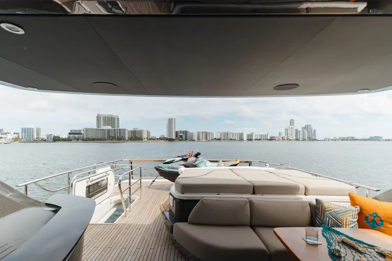 Slide: The Image of Luxurious 2021 Princess Y85 yacht deck with city skyline view. - 62