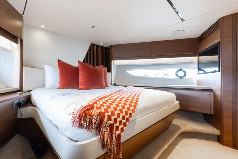 Slide: The Image of Luxurious bedroom interior of 2021 Princess Y85 yacht with modern design and cozy decor. - 47