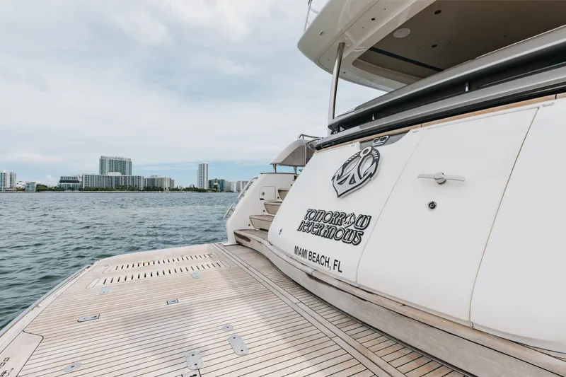 Slide: The Image of Luxury Princess Y85 yacht docked in Miami Beach, 2021 model, with city skyline view. - 20