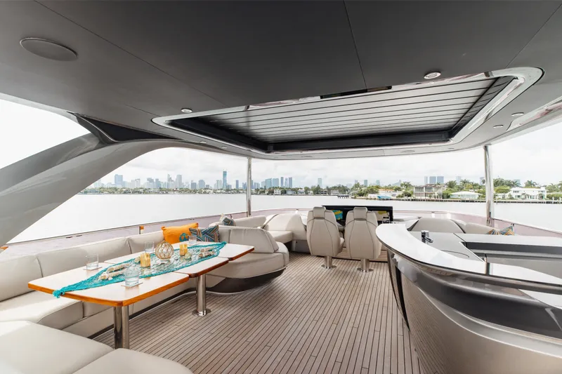 Slide: The Image of Luxurious 2021 Princess Y85 yacht interior with elegant seating and scenic waterfront view. - 3