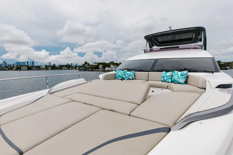 Slide: The Image of Luxurious 2021 Princess Y85 yacht with spacious sunbathing deck and scenic waterfront view. - 65