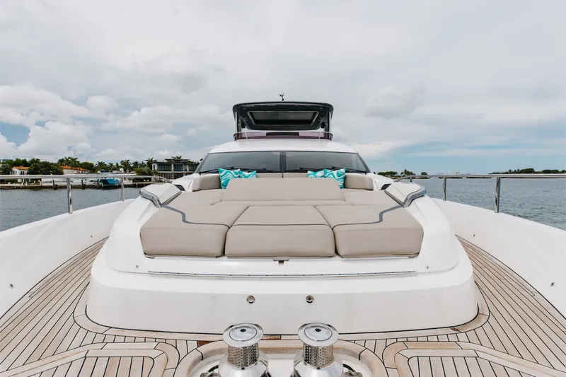 Slide: The Image of Luxurious 2021 Princess Y85 yacht with spacious deck and plush seating on open water. - 64