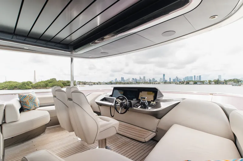 Slide: The Image of Luxurious 2021 Princess Y85 yacht interior with modern helm and city skyline view. - 61