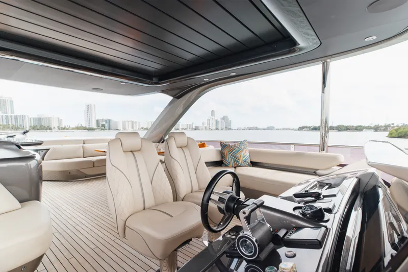 Slide: The Image of Luxurious 2021 Princess Y85 yacht interior with modern helm and city skyline view. - 60