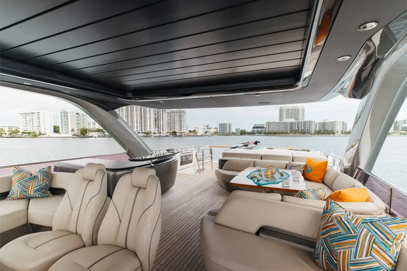 Slide: The Image of Luxurious 2021 Princess Y85 yacht interior with plush seating and vibrant cushions. - 59