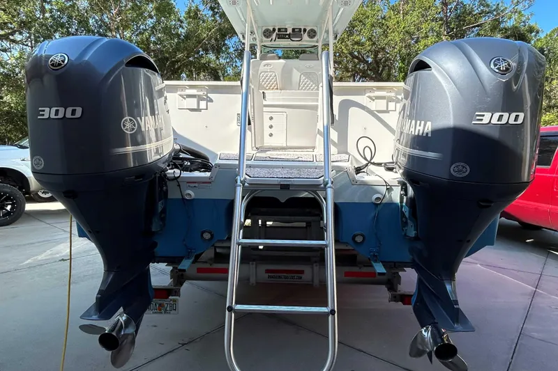 Slide: The Image of 2018 World Cat 320 CC boat with dual Yamaha 300 outboard engines. - 5
