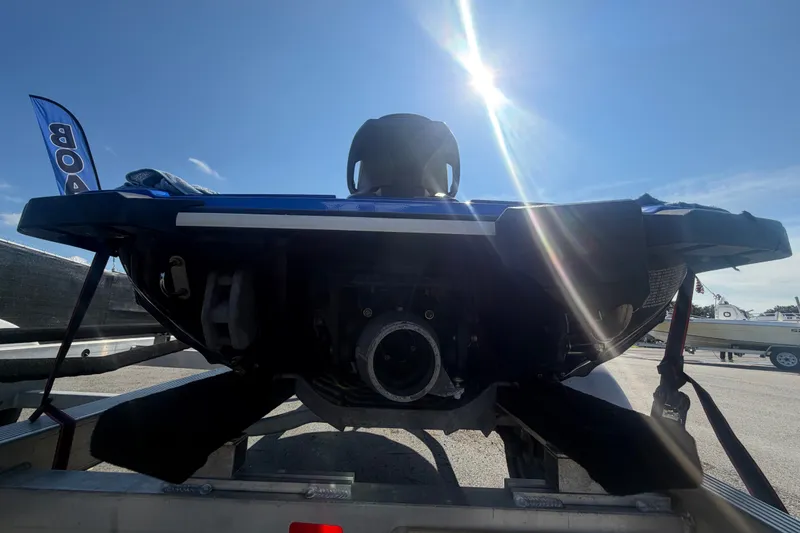 Slide: The Image of 2018 Yamaha WaveRunner EX Deluxe on trailer under bright sun. - 4