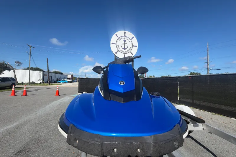 Slide: The Image of 2018 Yamaha WaveRunner EX Deluxe in blue, parked outdoors on a sunny day. - 8
