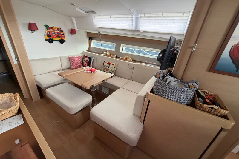 Slide: The Image of Interior of 2020 Jeanneau Sun Odyssey 490 yacht with cozy seating and decor. - 16