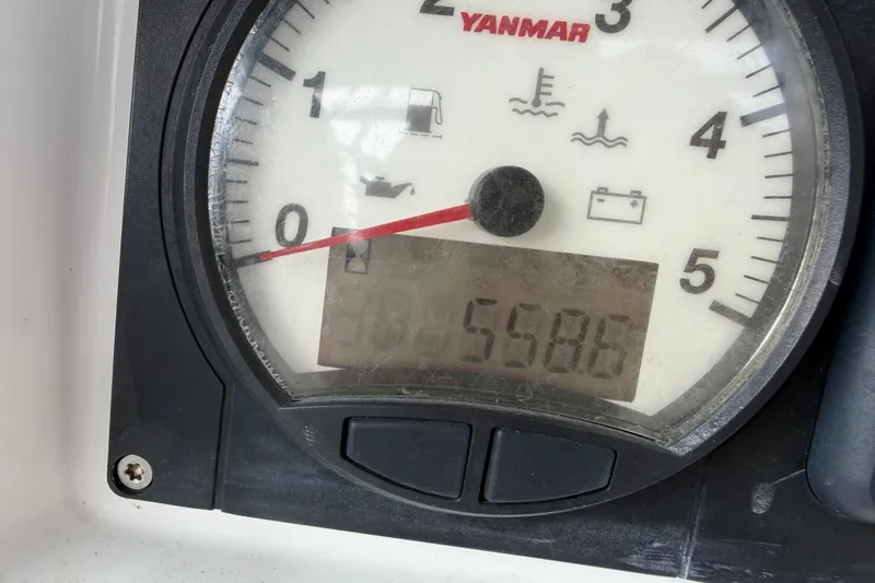 Slide: The Image of Yanmar engine gauge on 2020 Jeanneau Sun Odyssey 490, displaying 5586 hours. - 29