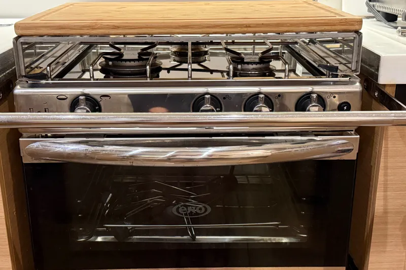 Slide: The Image of Stainless steel stove and oven in Jeanneau Sun Odyssey 490 yacht kitchen, 2020 model. - 32